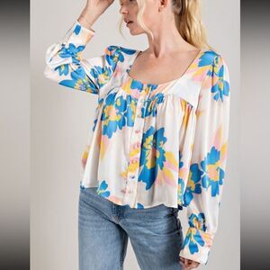 Multi color floral print blouse with button front NWT